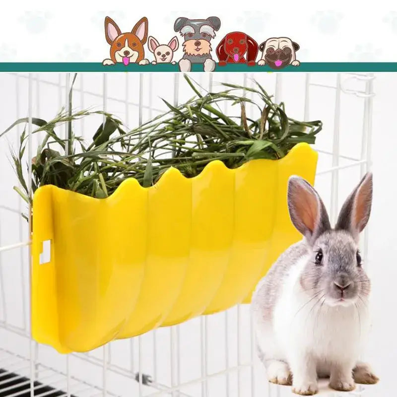 Bright yellow scalloped-edge plastic external rabbit hay feeder food rack mounted on a cage.
