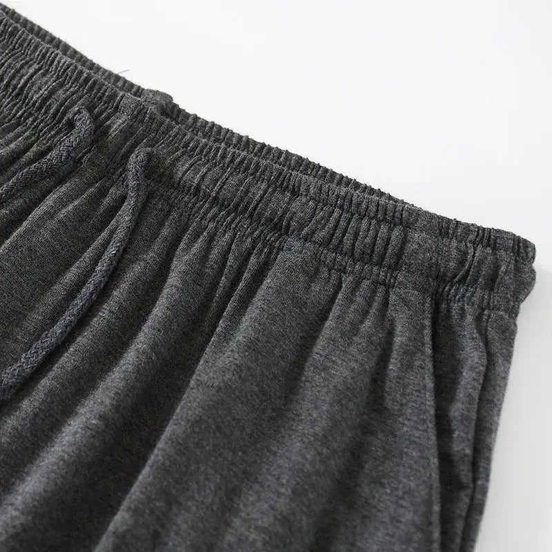 Herren-Modal-Cotton-Loungewear-Shorts in dunkelgrau meliertem Stoff mit elastischem Bund, ausgelegt für Komfort und Freizeitkleidung