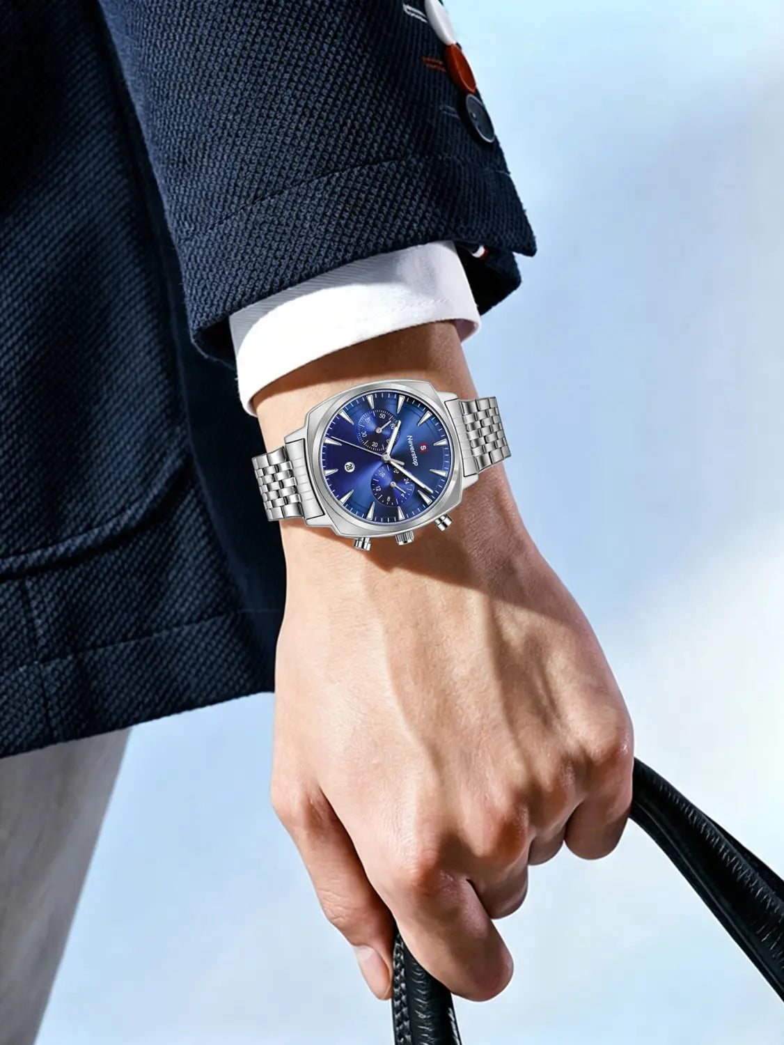 Men’s stainless steel chronograph watch featuring a silver-toned case, vibrant blue dial, and stainless steel link bracelet.
