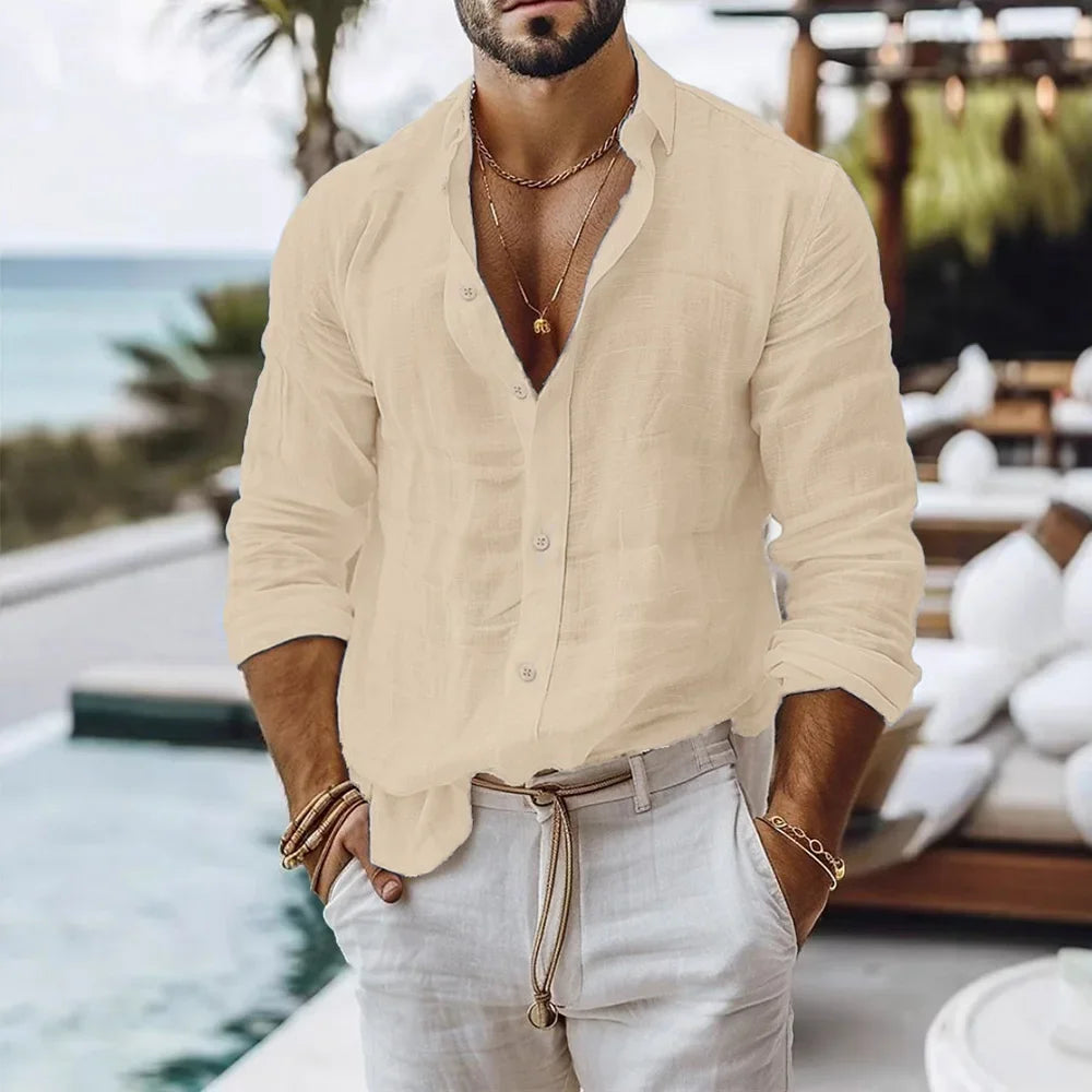 Beige linen men’s linen beach shirt with button down front relaxed fit and rolled sleeves.
