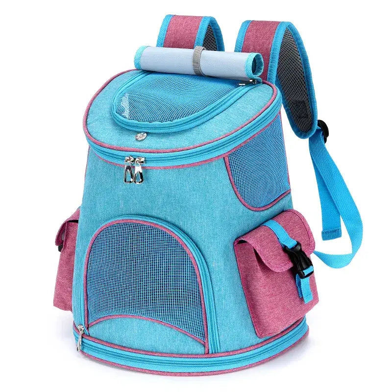 Mochila de viaje para mascotas de tela Oxford turquesa y rosa, con paneles de malla, correas ajustables y un asa enrollada, diseñada para caminatas y suministros para mascotas.