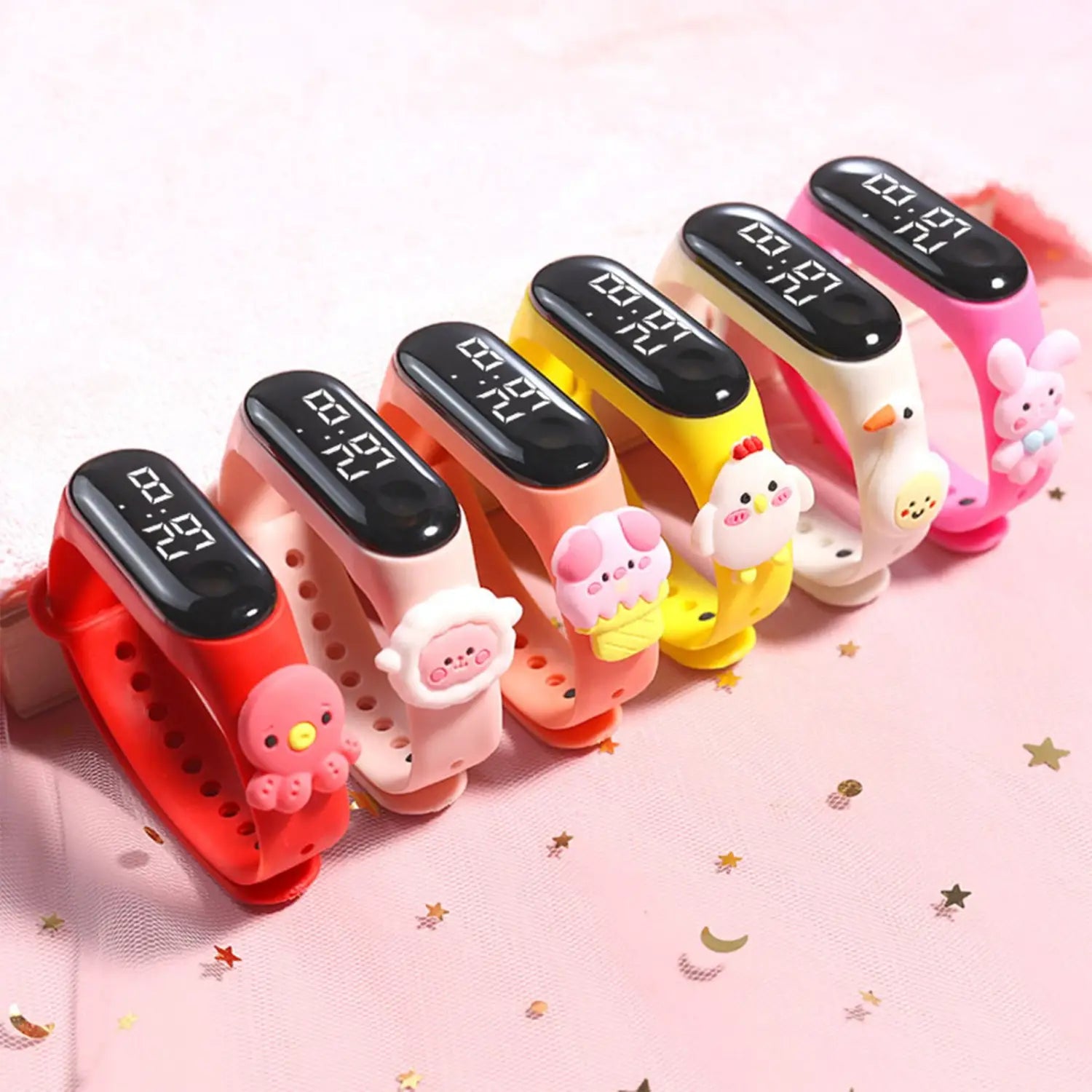 a row of colorful kids silicone digital watches featuring life waterproof material and cute animal charms with black lcd screens