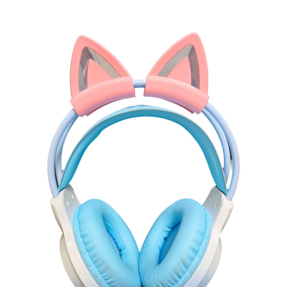 Attaches pour casque avec oreilles de chat en silicone rose pastel et bleu clair, avec des oreillettes souples et rembourrées pour une écoute confortable.