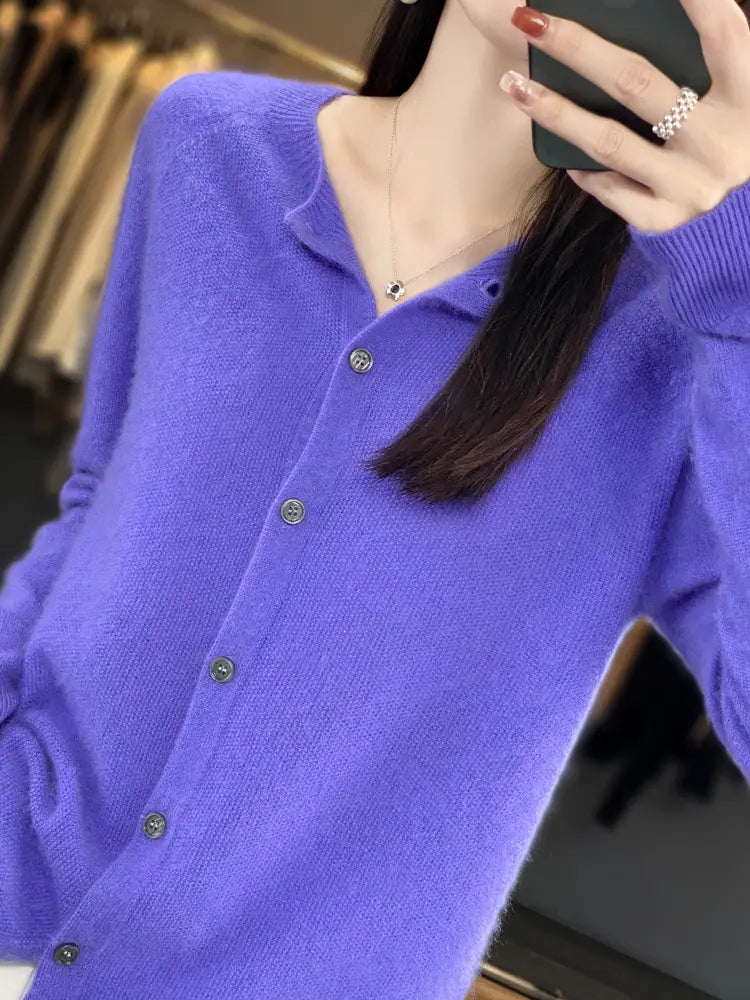 Vibrant purple merino wool cardigan for women featuring subtle texture and matching button closures in a cashmere knit sweater design.
