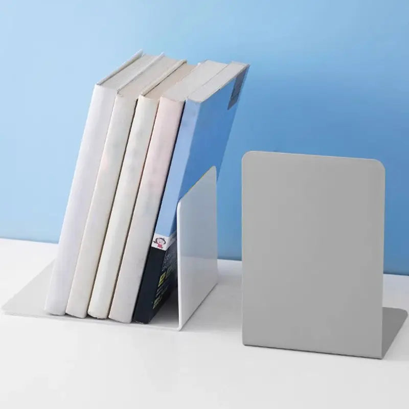 Minimalist white ceramic bookends with a sleek modern design for desktop use.