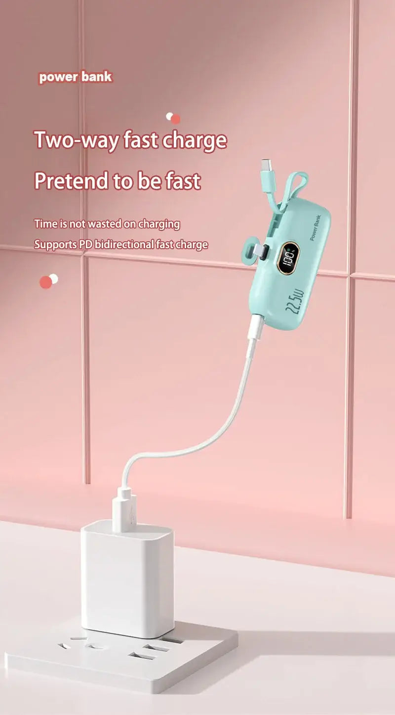 Light blue portable power bank 30000mah fast charger with built-in cables featuring a digital display and dual usb ports for efficient charging.