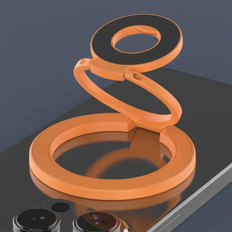 Anillo portateléfonos magnético de doble cara color naranja de silicona para Magsafe, mostrado desde el frente con el diseño del anillo magnético visible.