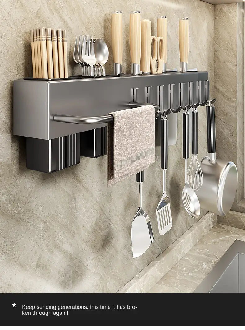 Modern matte black wall-mounted kitchen utensil holder and knife rack with integrated towel rack and multiple hooks for hanging tools.