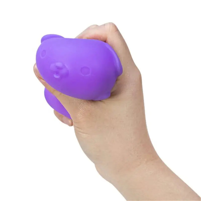 purple silicone sensory fidget toy shaped like a bear with rounded ears and simple facial features displaying quick rebound properties