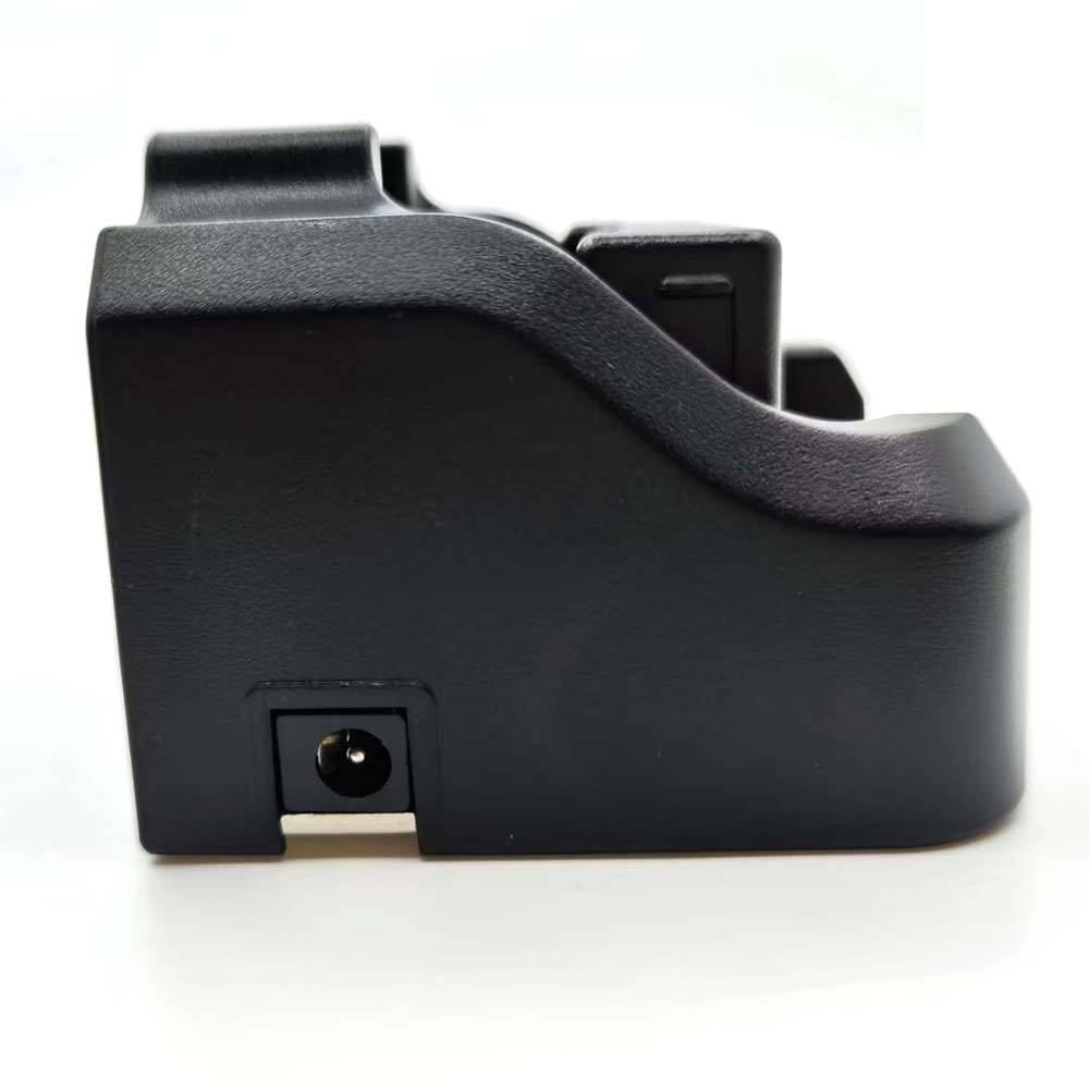 black plastic vhf marine radio charger with textured surface and integrated charging port for recent rs-38m model