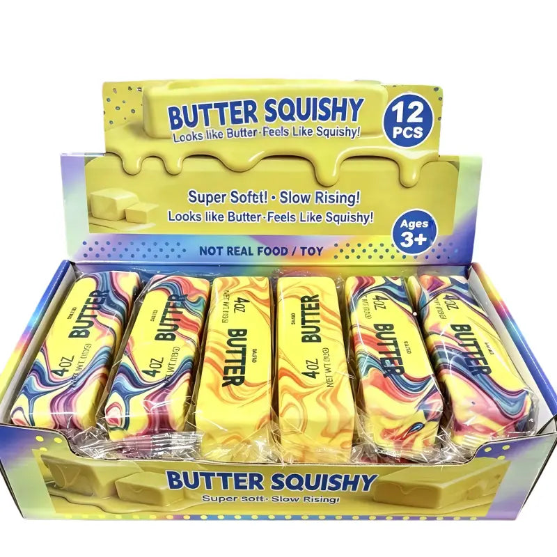 Jouet antistress souple à la forme de beurre à la fraise à montée lente, aux formes de beurre jaunes et multicolores marbrées, présenté dans une boîte de 12 pièces.