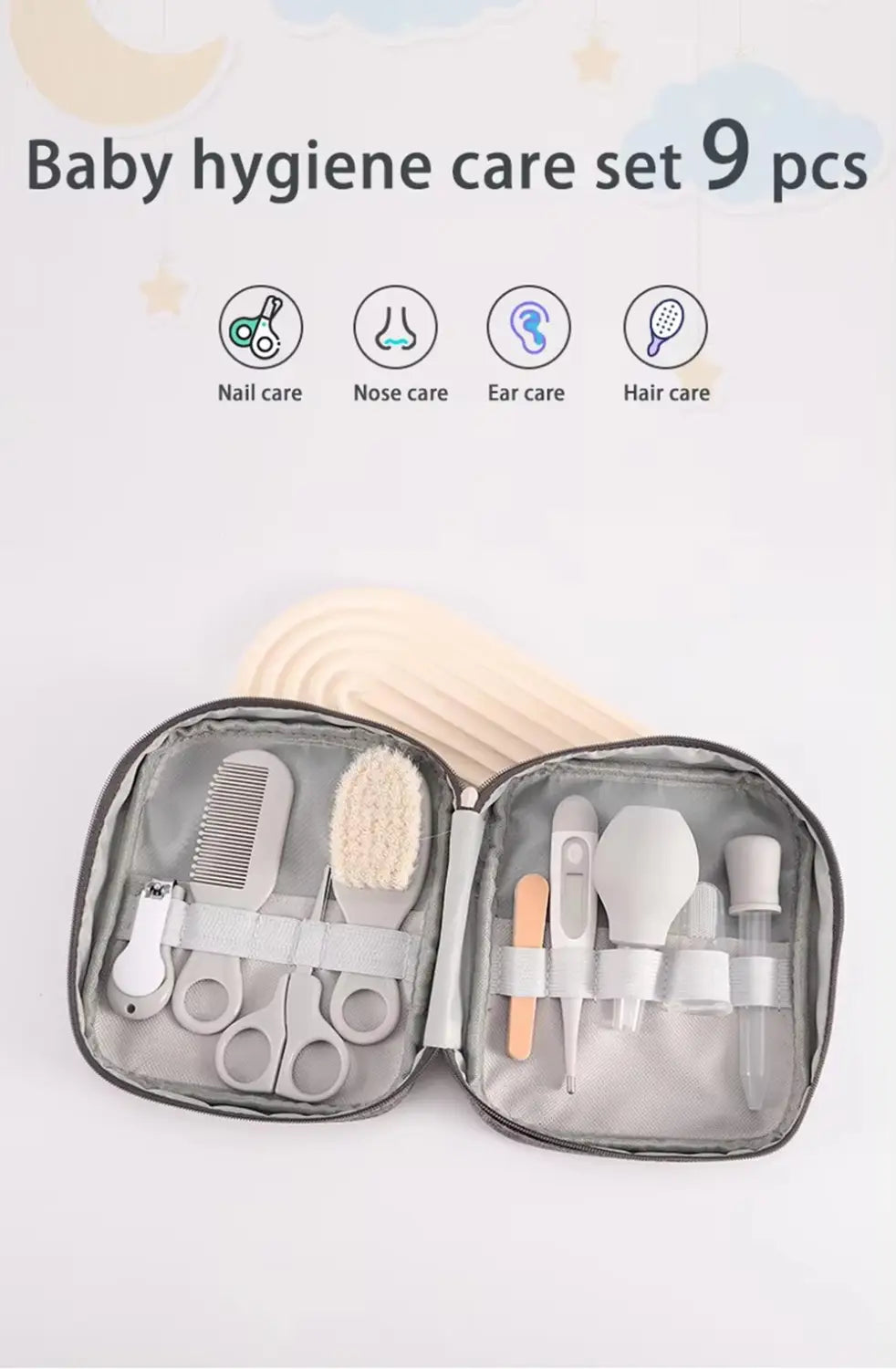 Graues und weißes Baby-Pflege-Set für Neugeborene, bestehend aus einer Ausstattung mit neun wesentlichen Babyhygiene-Tools, darunter Nagelschneider, Kamm, Bürste, Ohrenspritze und Thermometer, für eine umfassende Säuglingspflege.