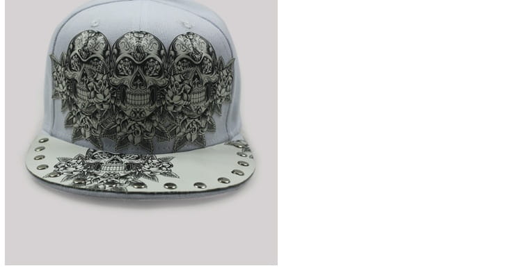 White snapback baseball cap featuring intricate black and gray sugar skull and floral designs with silver rivet accents along the brim.