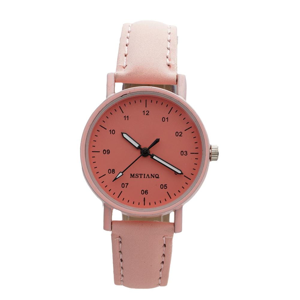 A delicate pink leather strap women quartz watch with a matching blush face and minimalist black hands designed as a waterproof wristwatch.