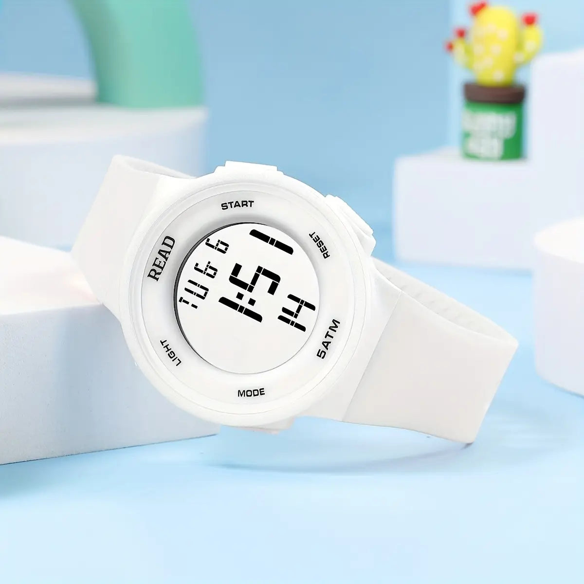 White led digital sports watch for women with bold black numerals on the display and a silicone strap designed for waterproof fitness use.