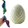 Glow-in-the-dark printed dragon egg fidget toy with segmented surface and flexible interlocking band design front view