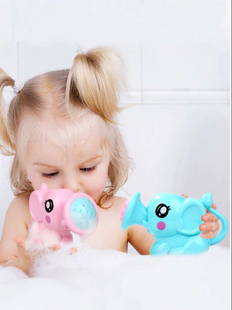 Spielerisches Baby-Bade-Spielzeug aus pinkem und blauem Kunststoff in Form eines Elefanten mit Wasserfontänen, großen Augen und einem Wasserauslass.
