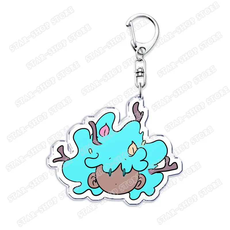 A turquoise and brown amphibia anime acrylic keychain cartoon keyring with a silver metal clasp.