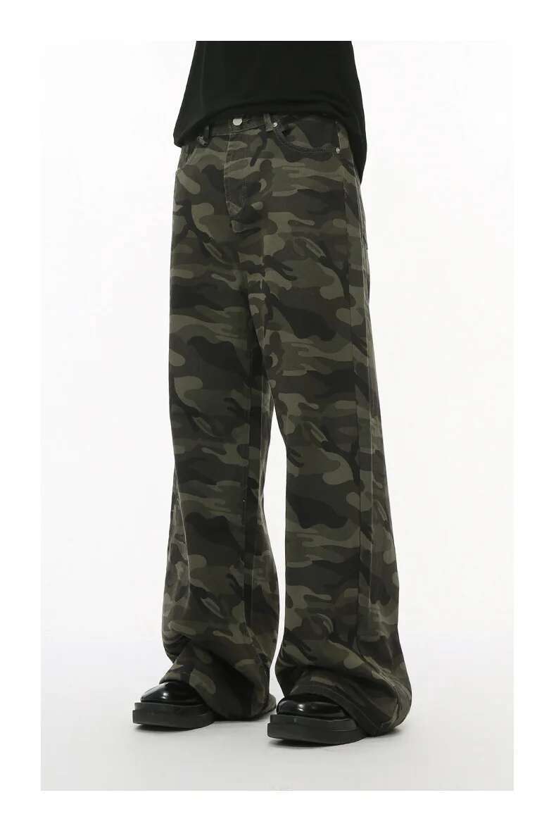 Iefb camouflage wide leg denim jeans featuring wide-leg camouflage pants in a muted green and black pattern made from sturdy denim fabric.