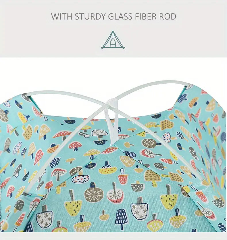 a turquoise pet tent featuring a playful pattern of colorful mushrooms and popsicles on its fabric with white cross-straps for support designed as a floral print cave bed for cats and dogs