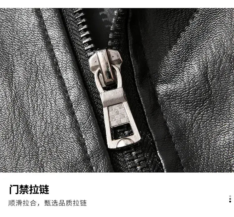 Men’s light green faux leather moto jacket with black leather jacket zipper and silver-toned metal pull tab featuring an embossed grid pattern.