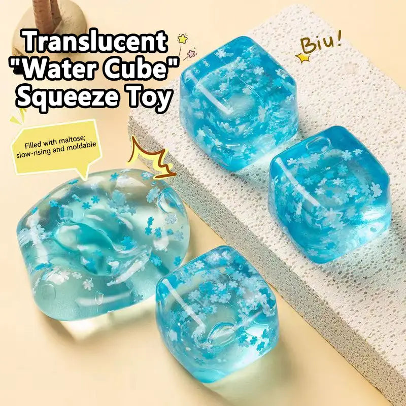 blue translucent cube-shaped squishy snowflake ice cubes filled with maltose and tiny white flower-like particles designed as slow rising sensory fidget toys