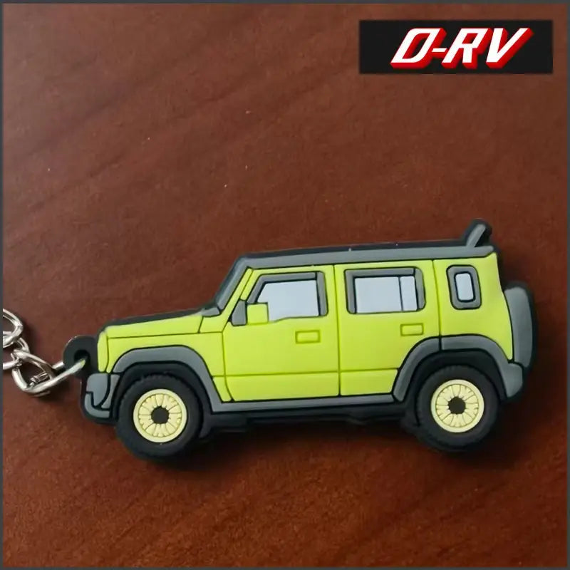 Bright lime green and black rubber Suzuki Jimny rubber keychain shaped like the JB64 JB74 SUV.