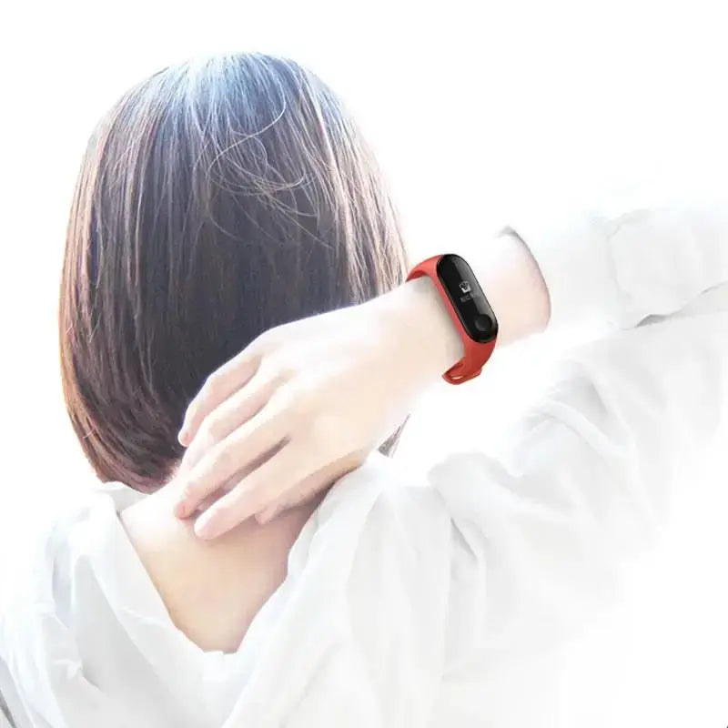 Red silicone band fitness tracker with black rectangular display for Xiaomi Mi Band wristband silicone bracelet use.