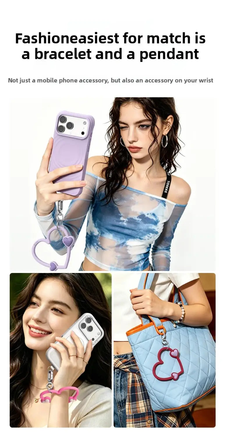 Anhänger in Herzform in Lila mit einem weichen, flexibel geformten Riemen und dazu passender Lavendel-Silikonhülle, von vorne dargestellt als Handy-Handgelenkriemen.