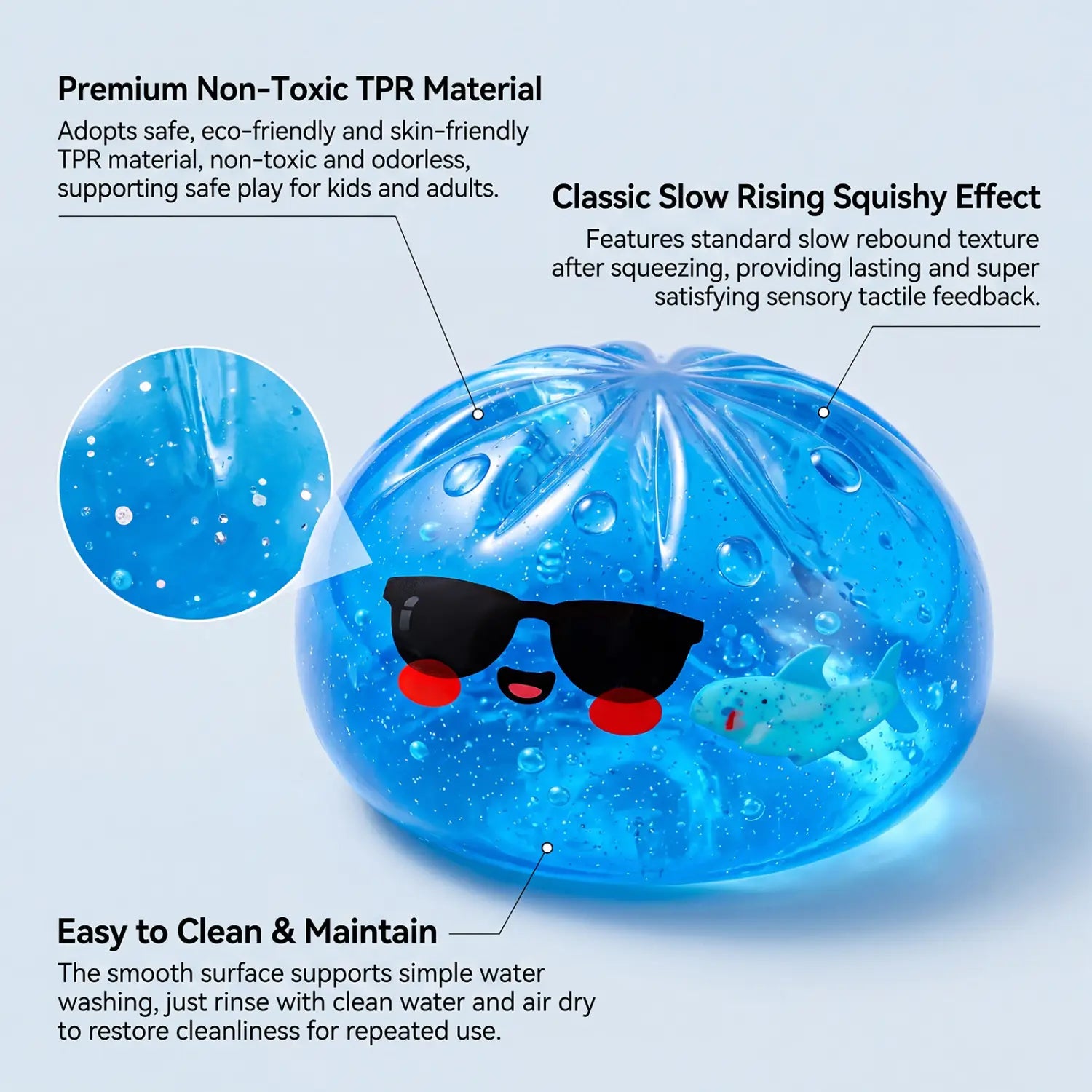 blue translucent squishy dumpling stress ball finished goods with black sunglasses, red cheeks, and a small shark inside.
