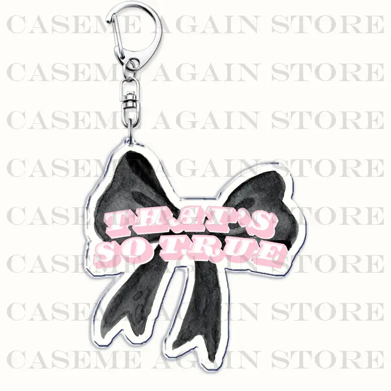 Black and pink bow-shaped acrylic keychain with playful that so true text designed as a Gracie Abrams anime fan gift.