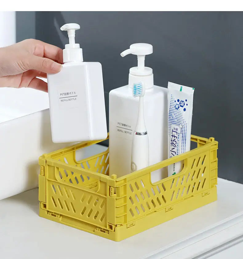 yellow plastic foldable storage basket made of lattice crate material suitable for versatile foldable storage solutions
