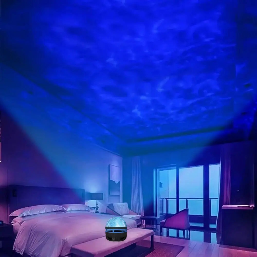 Projecteur lumineux de ciel étoilé à DEL bleu, avec une conception sphérique et une base noire, projetant un effet de nuit immersif dans toute la pièce.
