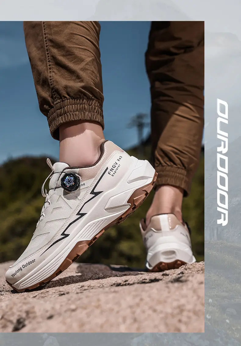 Beige and brown men hiking shoes waterproof lightweight trekking sneakers with sleek modern design featuring black lightning bolt accents on the side.