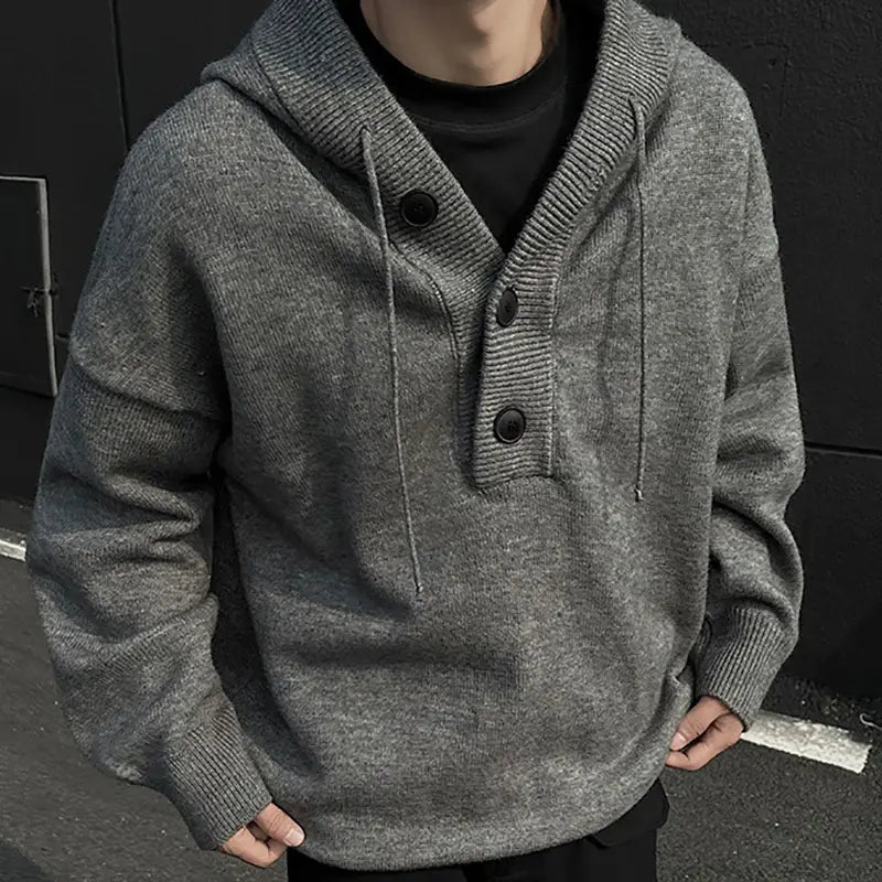 Herren-übergroßer grauer Strickpullover mit Kapuze, schwarze Knöpfe und gerippte Bündchen, entworfen im Retro-Streetwear-Pullover-Stil