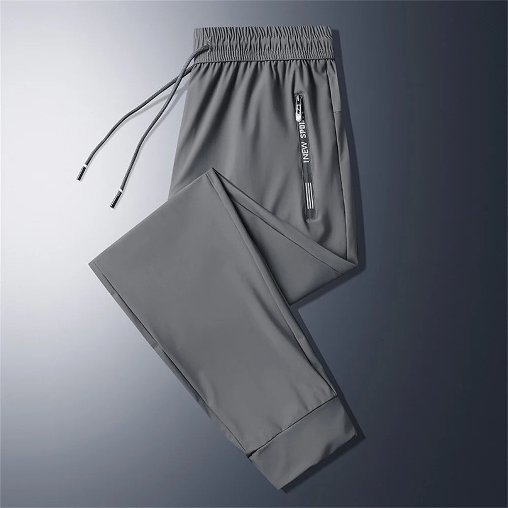 Casual Pants Men Fitness Sportswear Tracksuit Bottoms Skinny Sweatpants Cotton Trousers Gyms Jogger Track Pants Mens Joggers 5XL