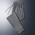 Casual Pants Men Fitness Sportswear Tracksuit Bottoms Skinny Sweatpants Cotton Trousers Gyms Jogger Track Pants Mens Joggers 5XL