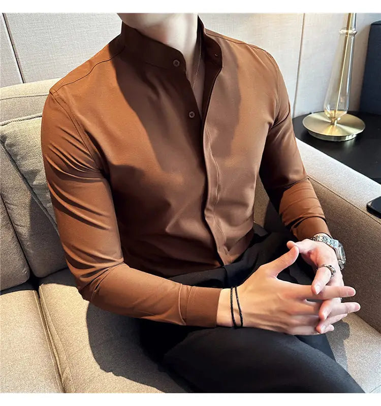 A sleek brown slim fit dress shirt with a modern mandarin collar and long sleeves designed for a formal look and correct size.