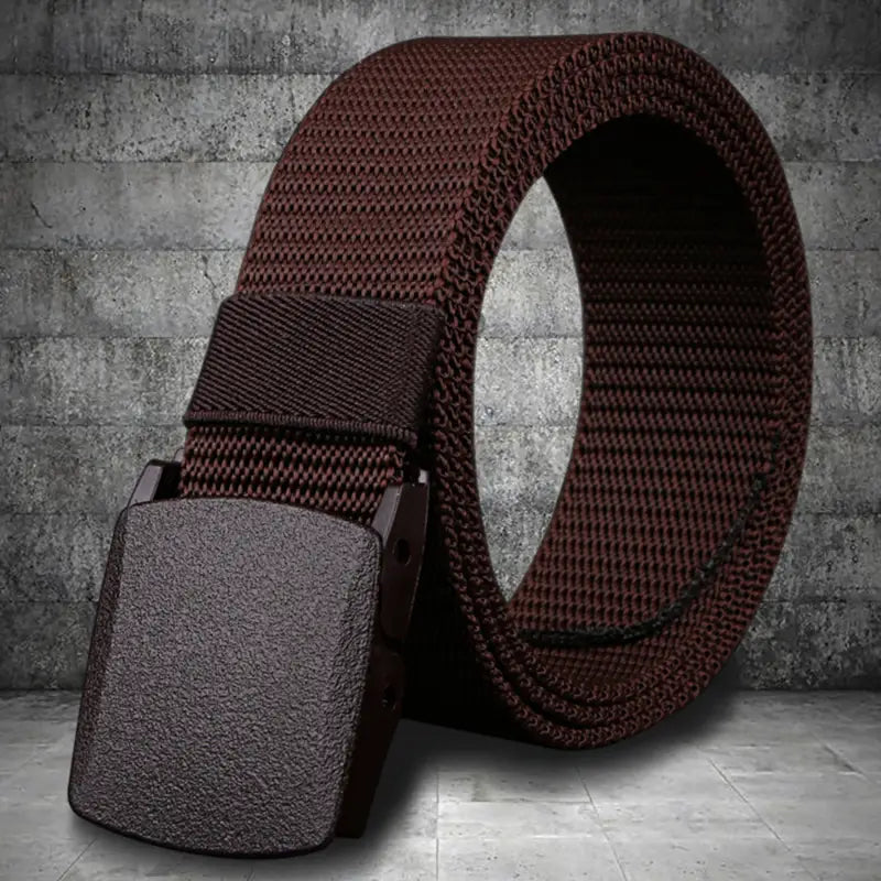 mens tactical canvas belt lightweight automatic buckle in brown featuring a textured matte finish plastic buckle and durable webbing material