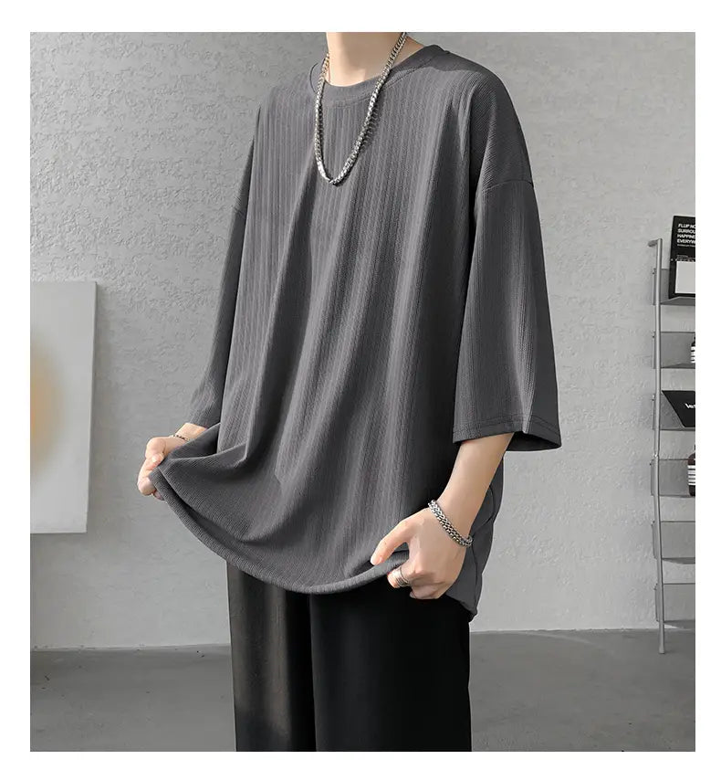 Men striped oversized summer t-shirt in dark gray ribbed cotton with relaxed fit and three-quarter sleeves.