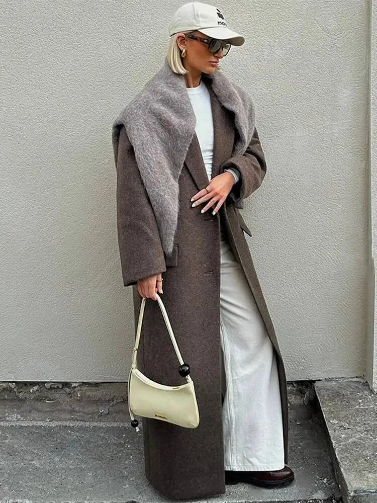 brown wool blend overcoat for women winter commuter jacket paired with cream-colored mini shoulder bag featuring black spherical hardware and minimalist design.