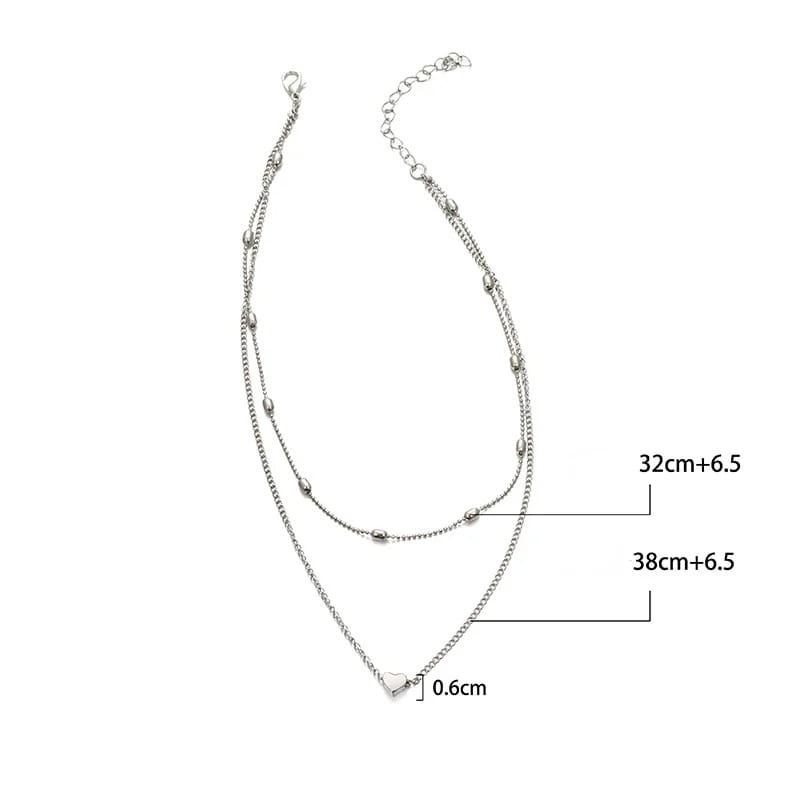 silver double-layered alloy jewelry anklet with delicate chain links and a small heart charm designed for women avoiding contact with chemical substances