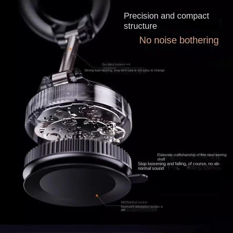 Silver-toned mechanical watch movement with intricate gearwork and zinc alloy support rod shown on the back side of a magnetic car phone mount 360 dashboard holder.