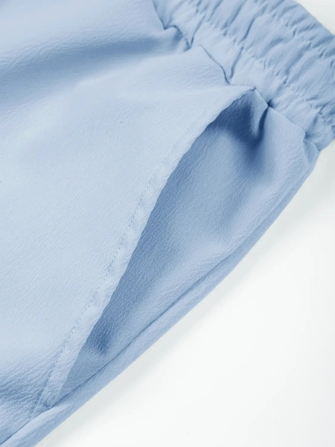 Leichte Leinenjogginghosen für Herren in Hellblau mit weichem Stoff, elastischem Bund und dezent angenähter Tasche.