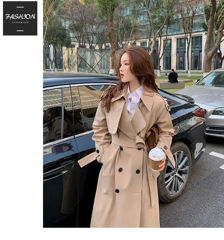 Beige women double-breasted trench coat casual windbreaker with black buttons and belted waist.