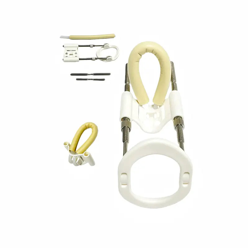 White plastic and beige silicone cervical traction device with adjustable metal components shown on a home gym storage rack organizer for fitness equipment.