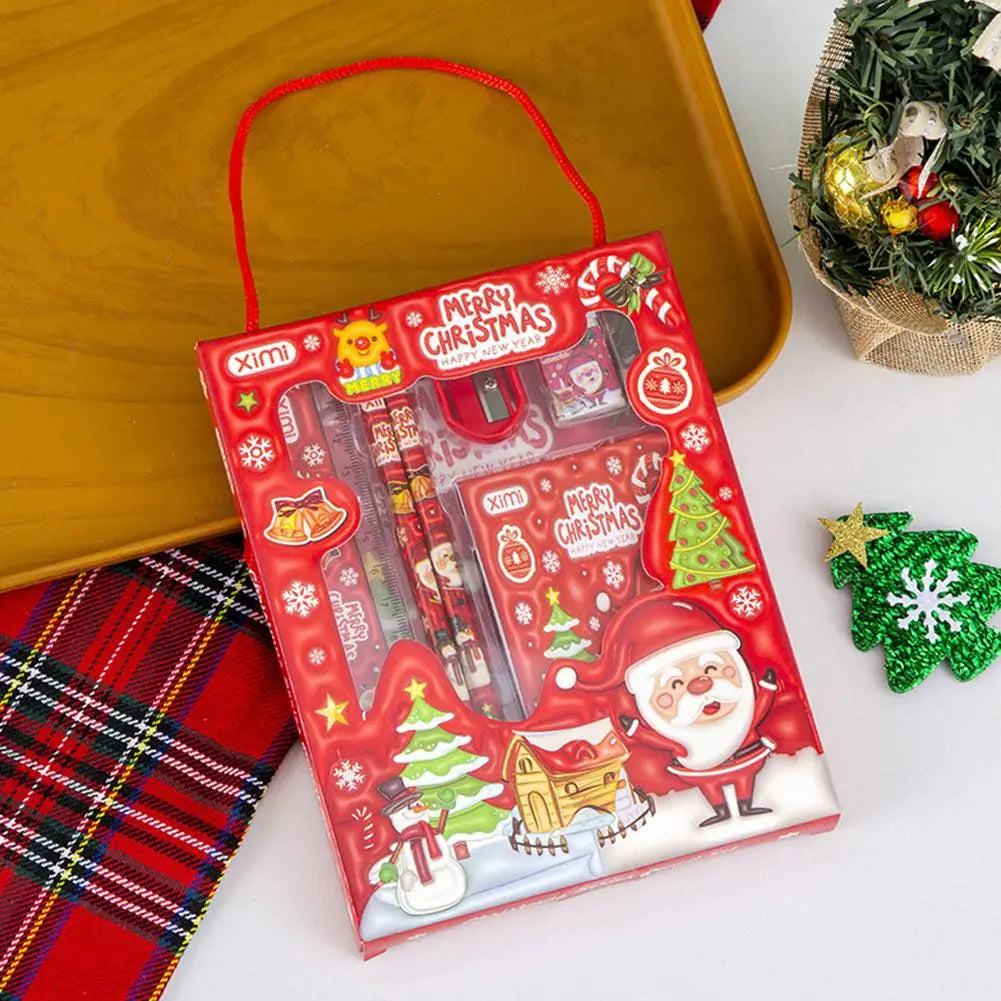 Red Christmas-themed glossy plastic stationery set by ximi with festive Santa Claus and snowmen illustrations and a red handle for kids.