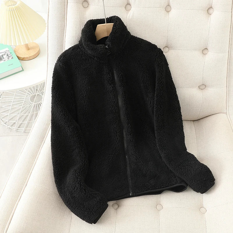 black fluffy fleece jacket with high collar and full-length zipper from women reversible fleece winter coat collection for cold weather use