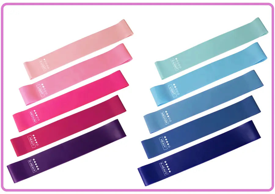 A set of colorful purple resistance bands made of elastic material arranged neatly on a white background for home fitness use.