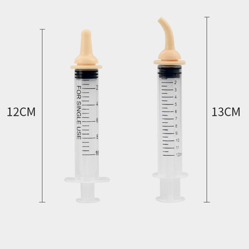 Two transparent plastic pet oral syringes marked for single use with one featuring a rounded tip and the other a curved nozzle included in a silicone nipple feeder set.